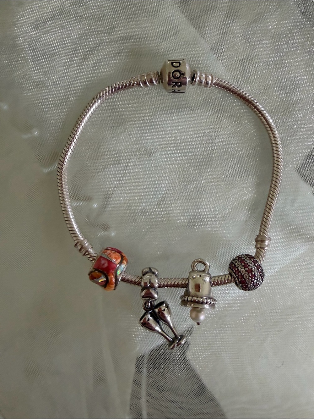Pandora Silver Bracelet with Red, Orange and Pink Charms